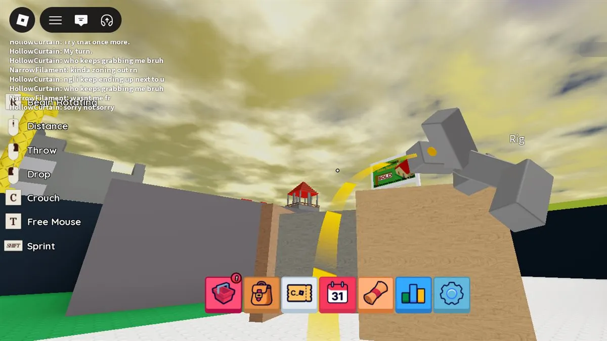 A crate held in the air on the end of a yellow grab beam, seen from behind the player
